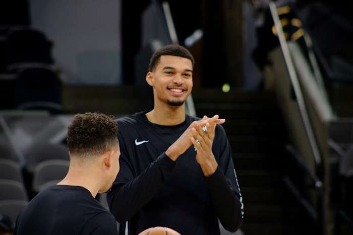 Jan 4, 2024; San Antonio, Texas, USA; San Antonio Spurs rookie Victor Wembanyama (1) smiles while fans sing him 'Happy Birthday' prior to facing the Milwaukee Bucks.